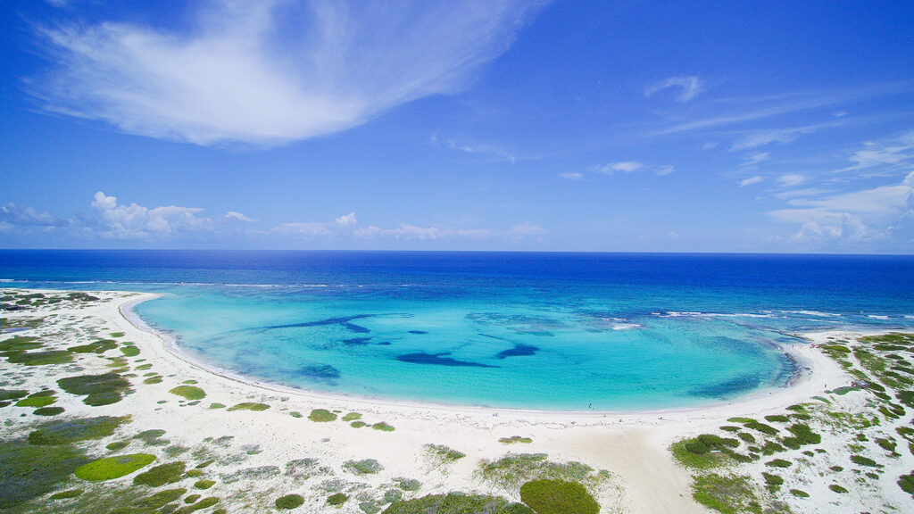 San Nicolas North Baby Beach Aruba Turquoise waters. Top things to do in Aruba
